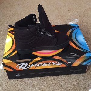 Brand new Heelys skate shoe
